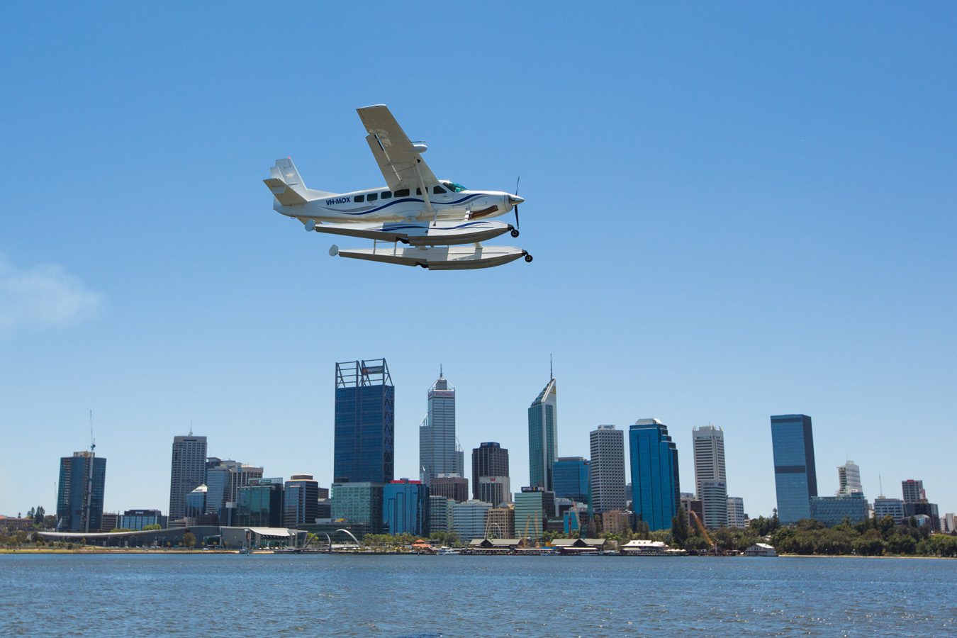 Cessna 208 over Perth City